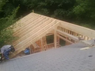 Framing a new roof addition that ties into an existing shingle roof in Snow Camp
