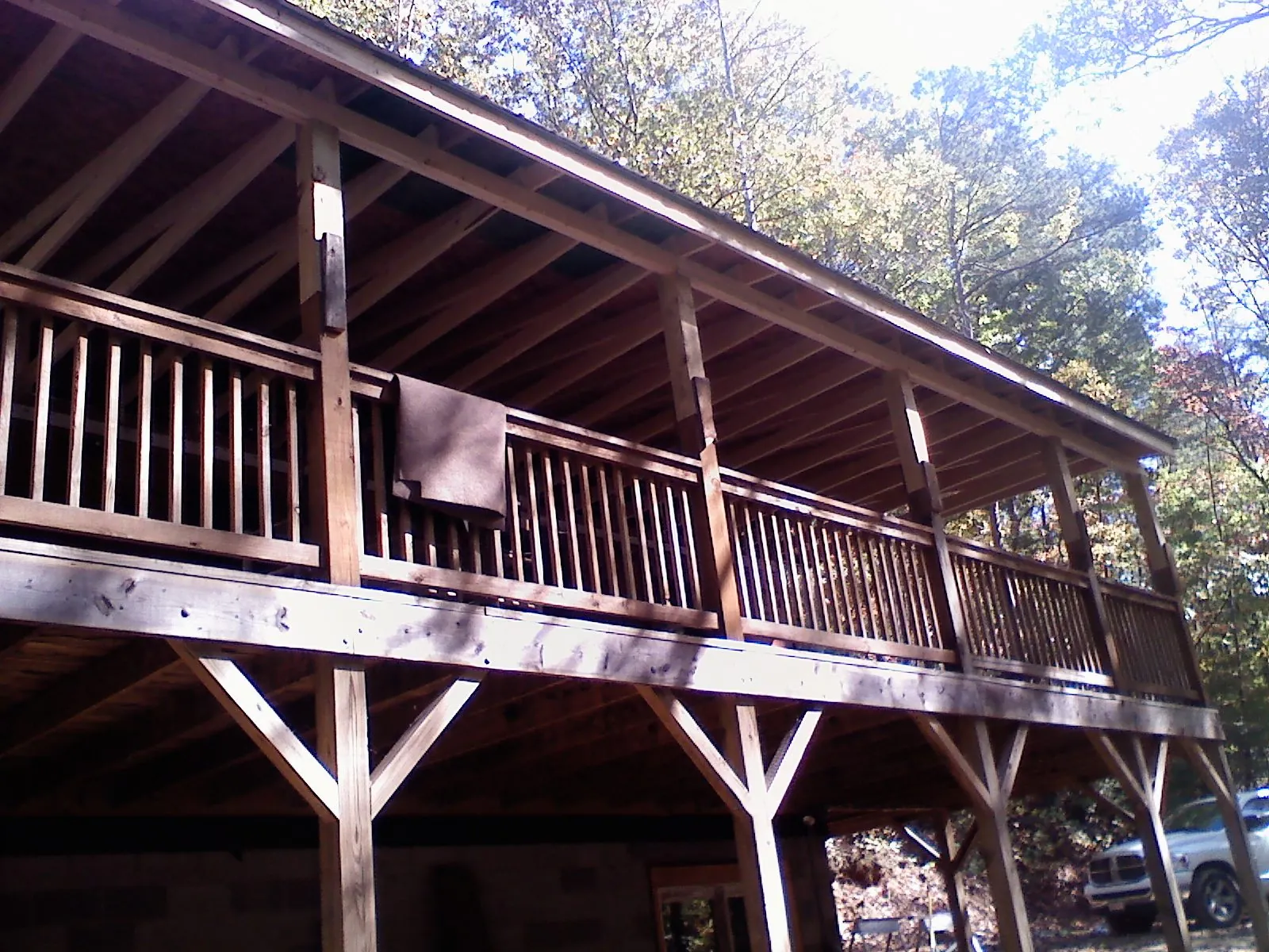 Timber framing under a new elevated porch and deck — Roof Leak Repair in Snow Camp by Roofing Brothers